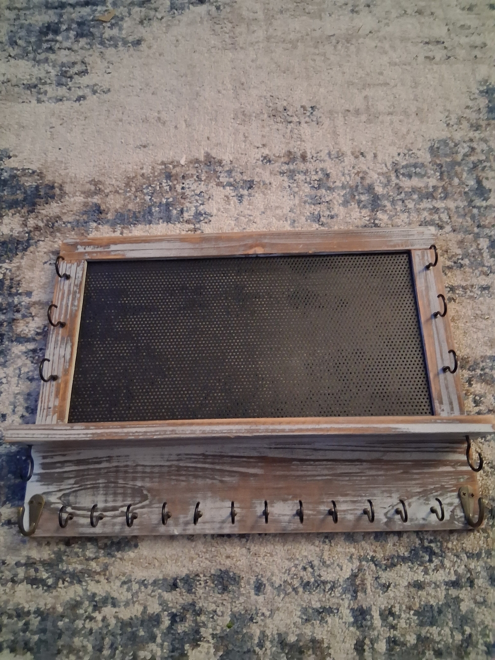 Distressed Wood Wall Display Shelf with Black Metal Panel and Hooks